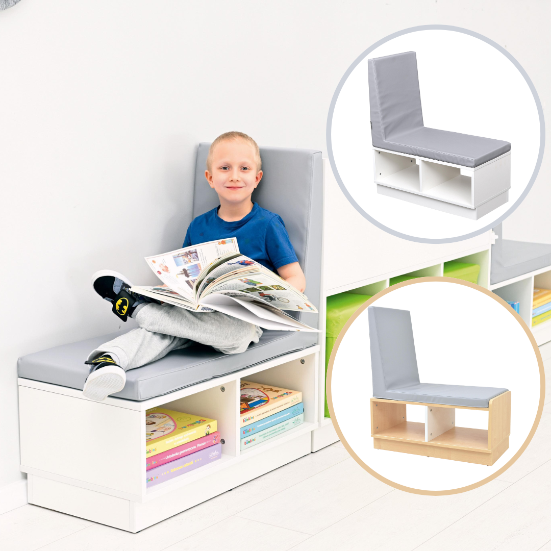 Kind liest auf Sitzbank mit Regal in Leseecke. - Produkt wird im Kindergarten oder Schule genutzt.